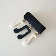 Bow & Crossbones Laverne Music Notes Brooch - Black & White